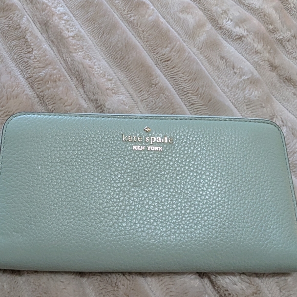 kate spade Handbags - Kate Spade Mint Leather Accessory with Gold Detail